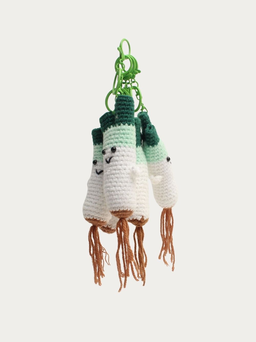 Bijoux de sac Poireau au crochet, vue de plusieurs angles