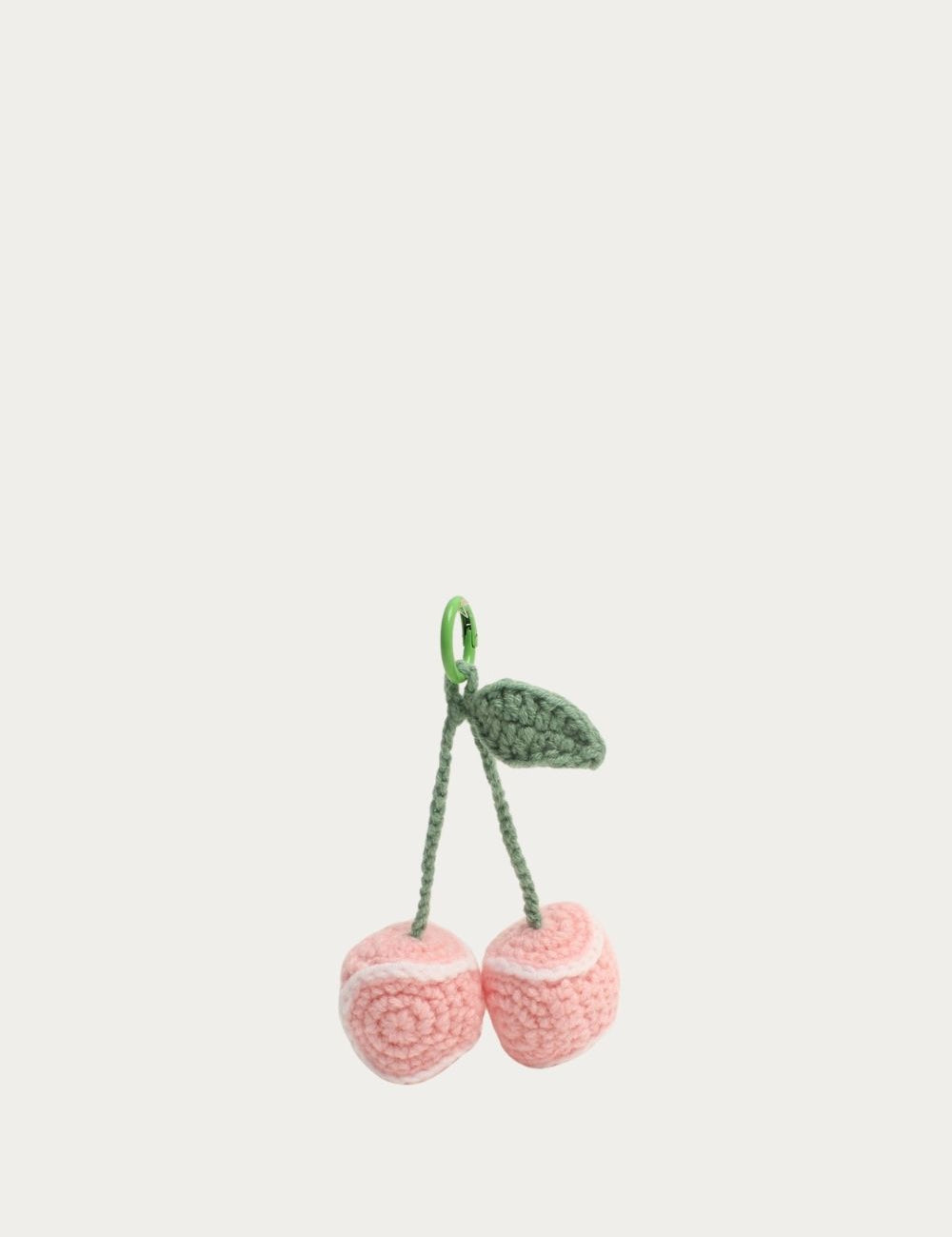 Bijou de sac Cerises roses au crochet avec feuille verte
