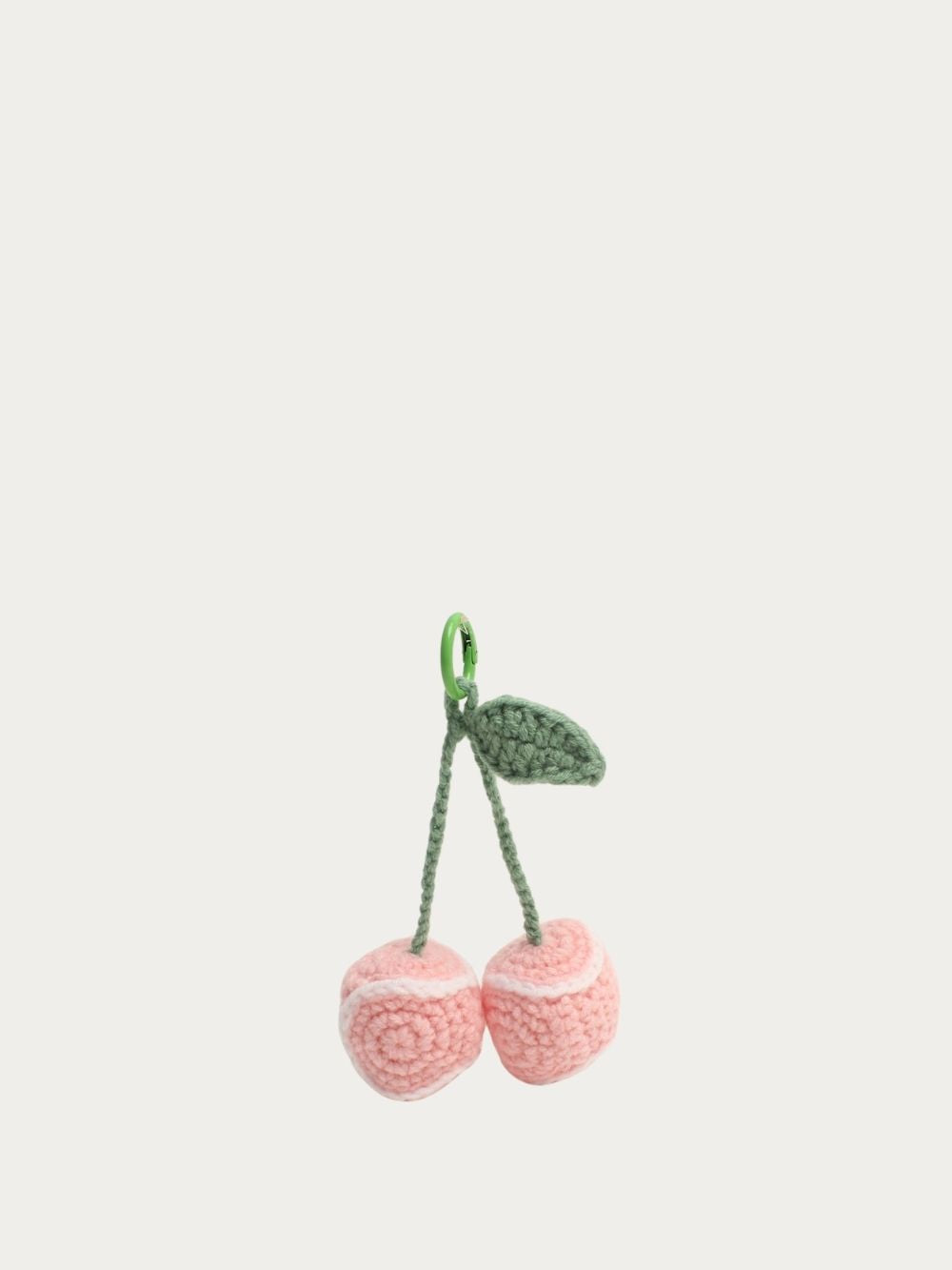 Bijou de sac Cerises roses au crochet avec feuille verte