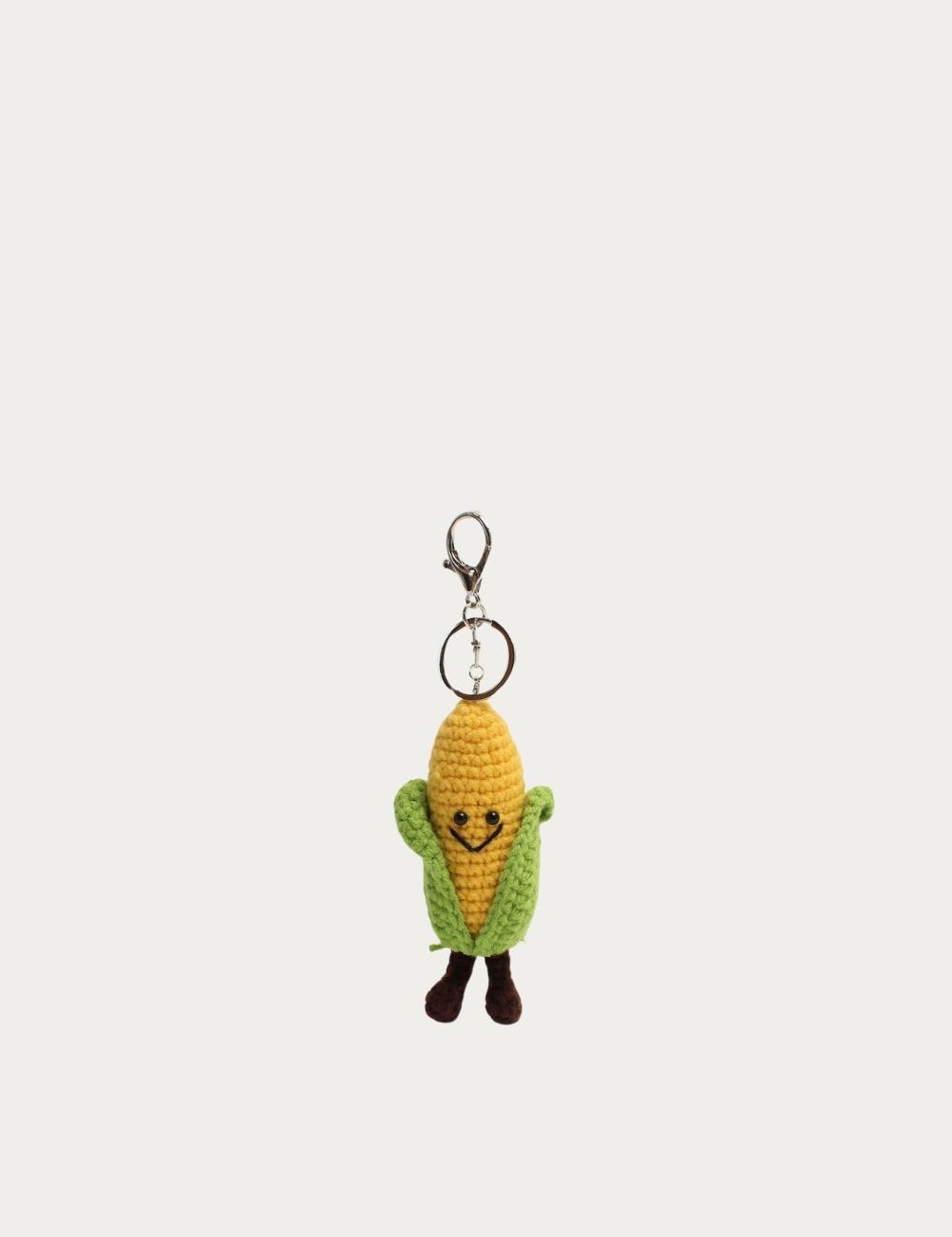 Bijou de sac Maïs au crochet jaune et vert, vue de face