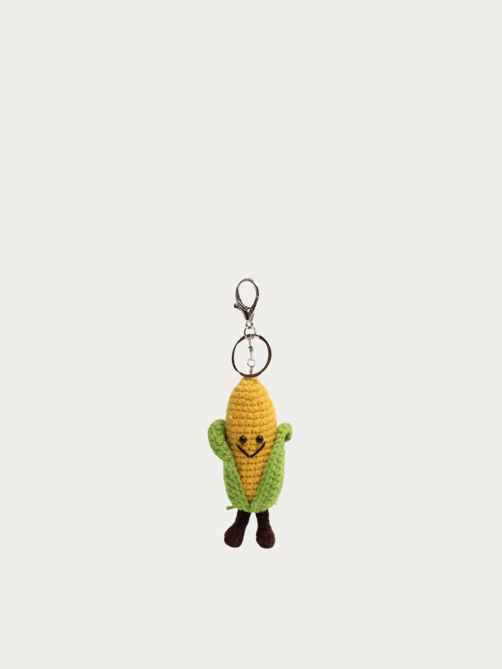 Bijou de sac Maïs au crochet jaune et vert, vue de face