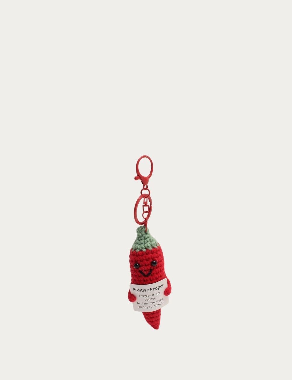 Bijou de sac Piment au crochet rouge et vert avec message positif